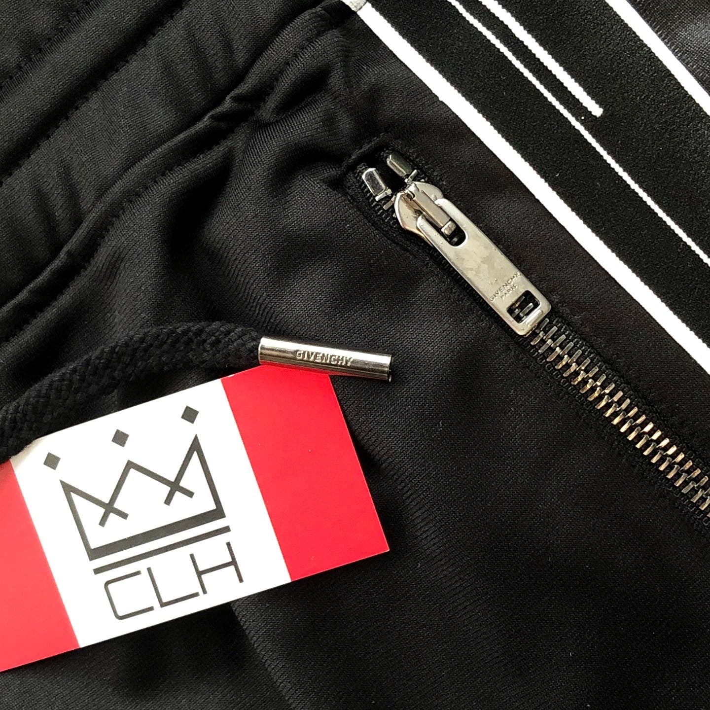 GIVENCHY TICKER LOGO TRACK SHORTS